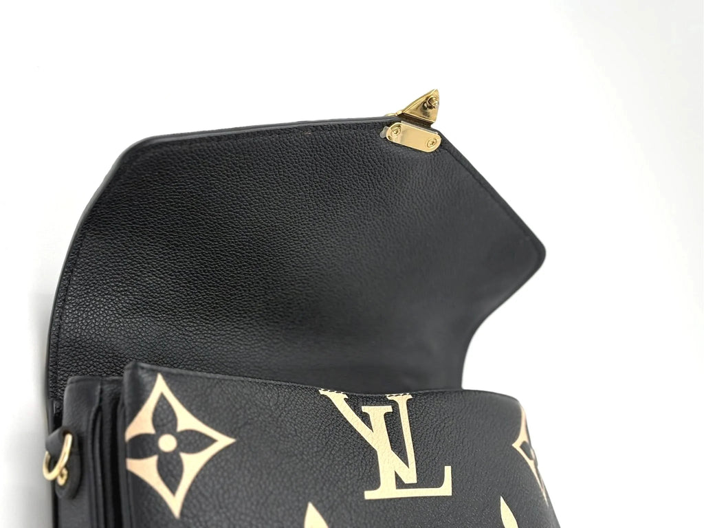 LOUIS VUITTON Pochette Metis bicolor monogram empreinte leather (microchipped)