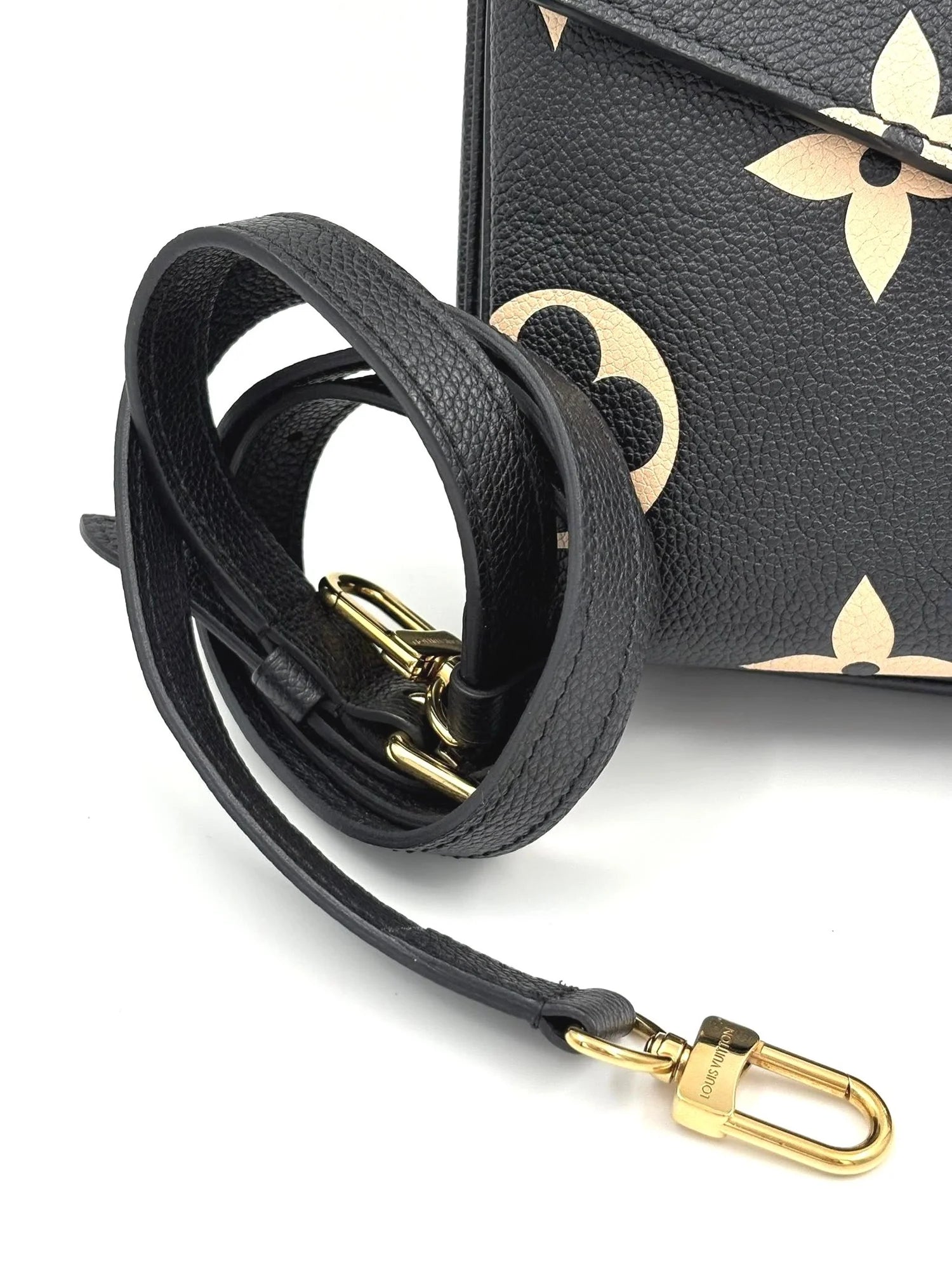 LOUIS VUITTON Pochette Metis bicolor monogram empreinte leather (microchipped)