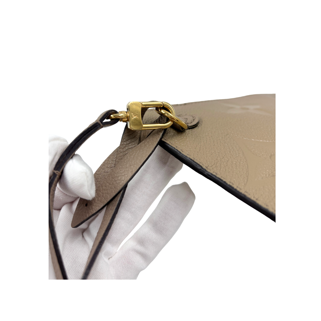 LOUIS VUITTON Neverfull pouch empreinte dove color (Microchipped)