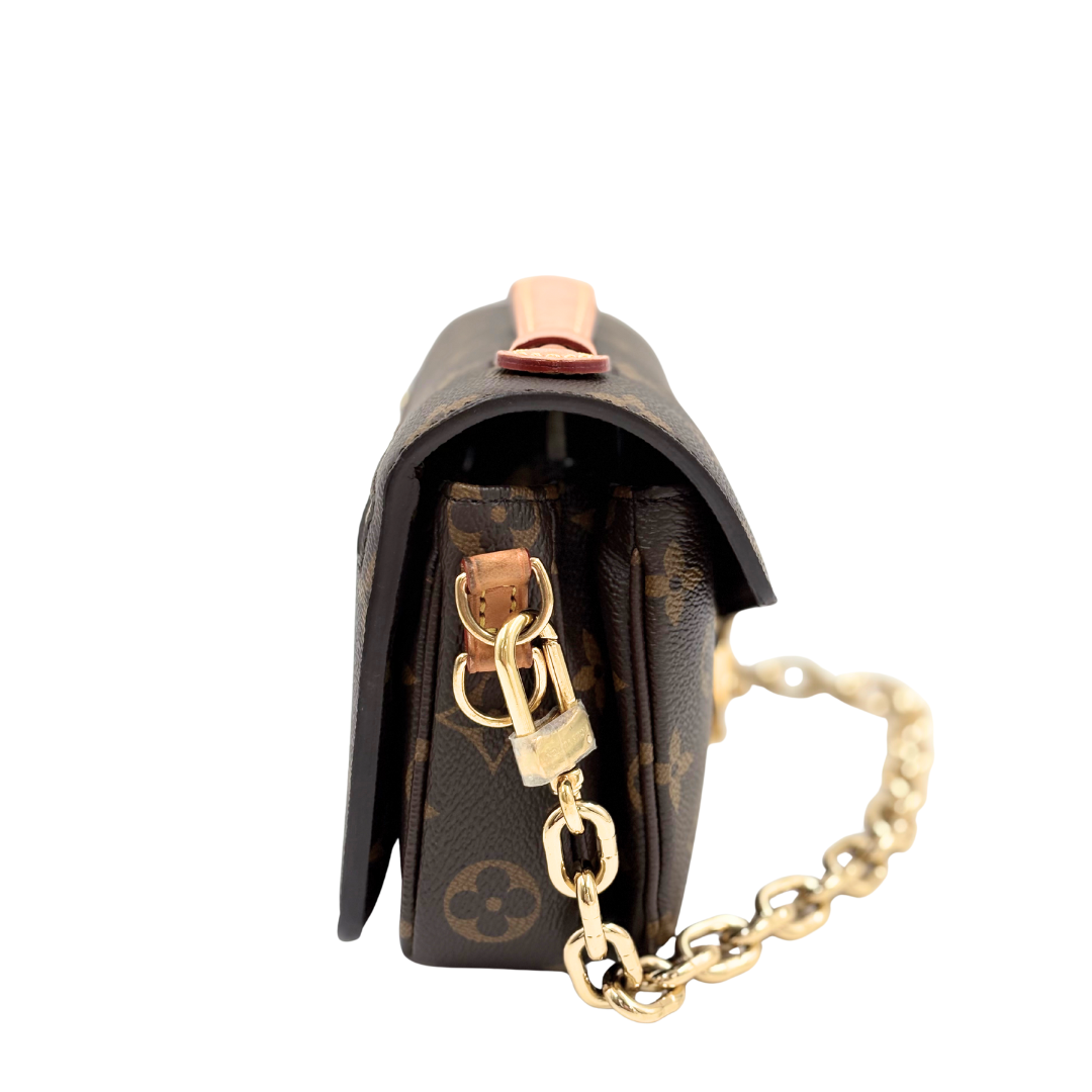 LOUIS VUITTON Pochette Metis East West in monogram canvas (microchipped)