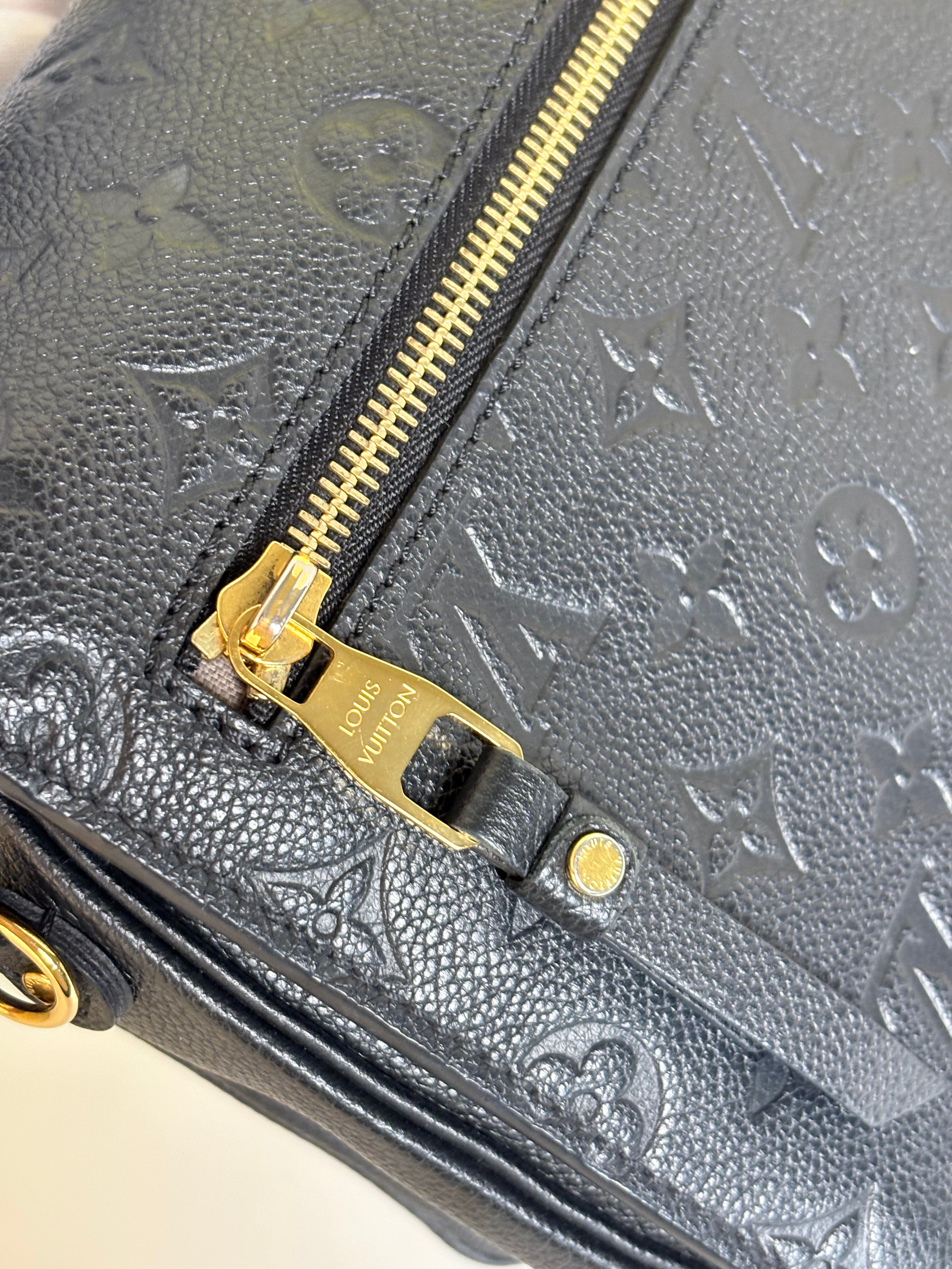 LOUIS VUITTON Metis empreinte black leather