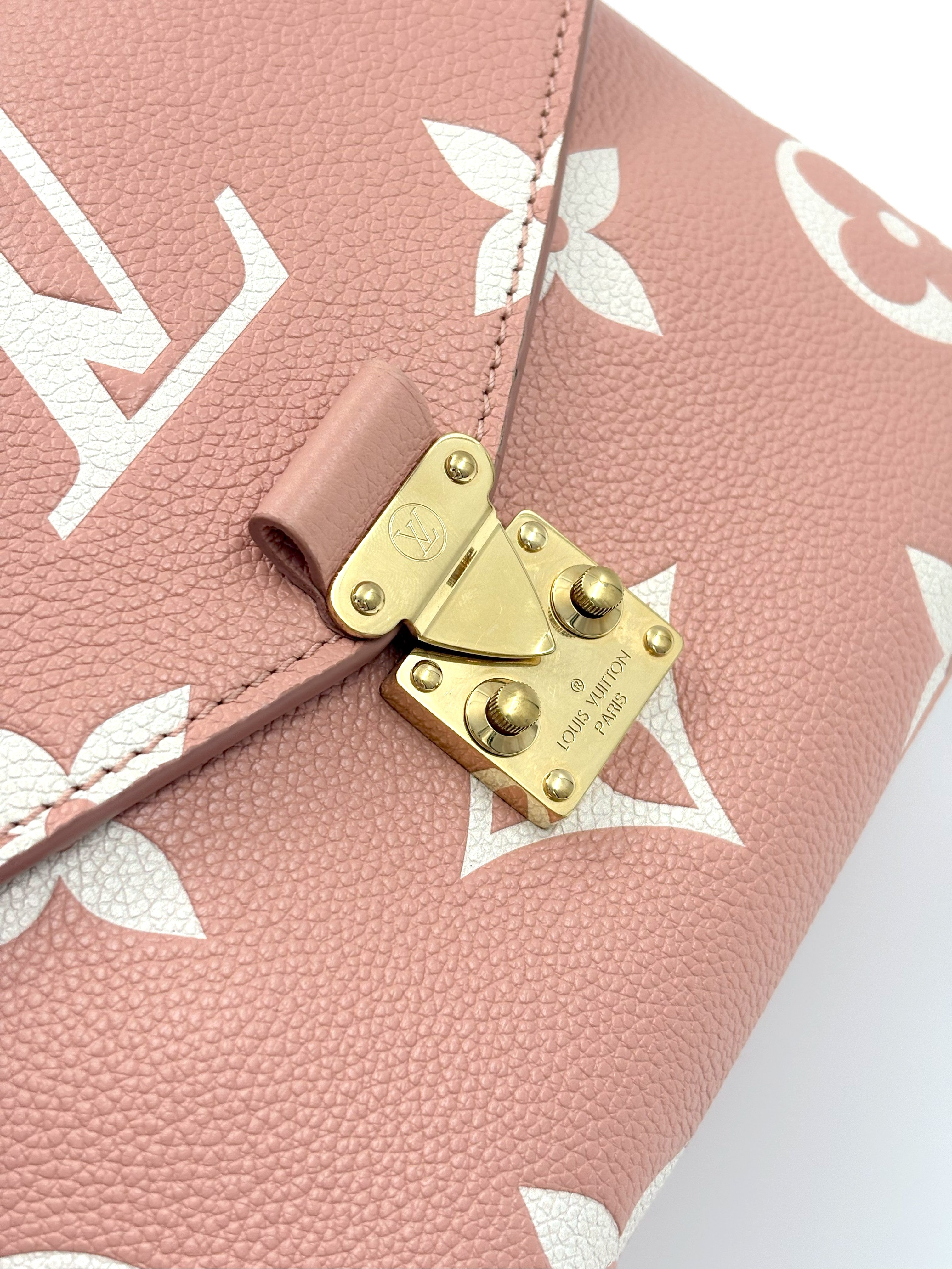LOUIS VUITTON Pochette Metis bicolor monogram empreinte leather (microchipped)