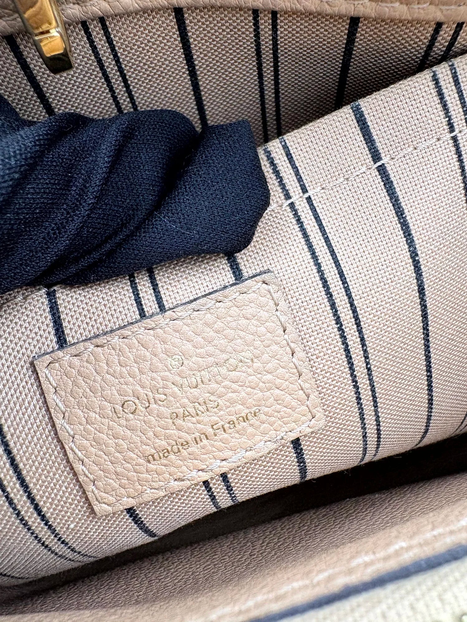 LOUIS VUITTON Montaigne MM neutrals Empreinte leather