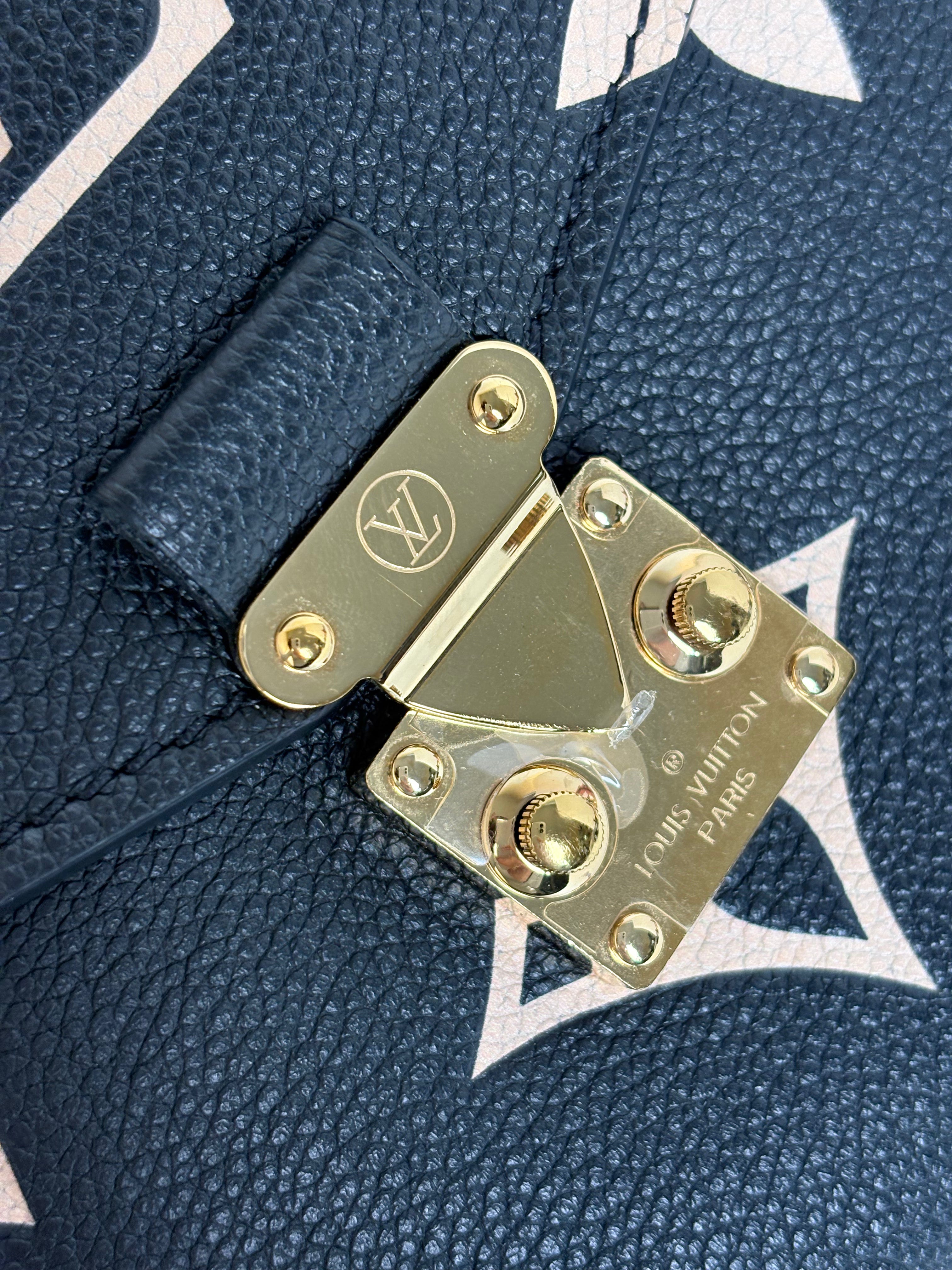 LOUIS VUITTON Bicolor Monogram Empreinte Pochette Métis
