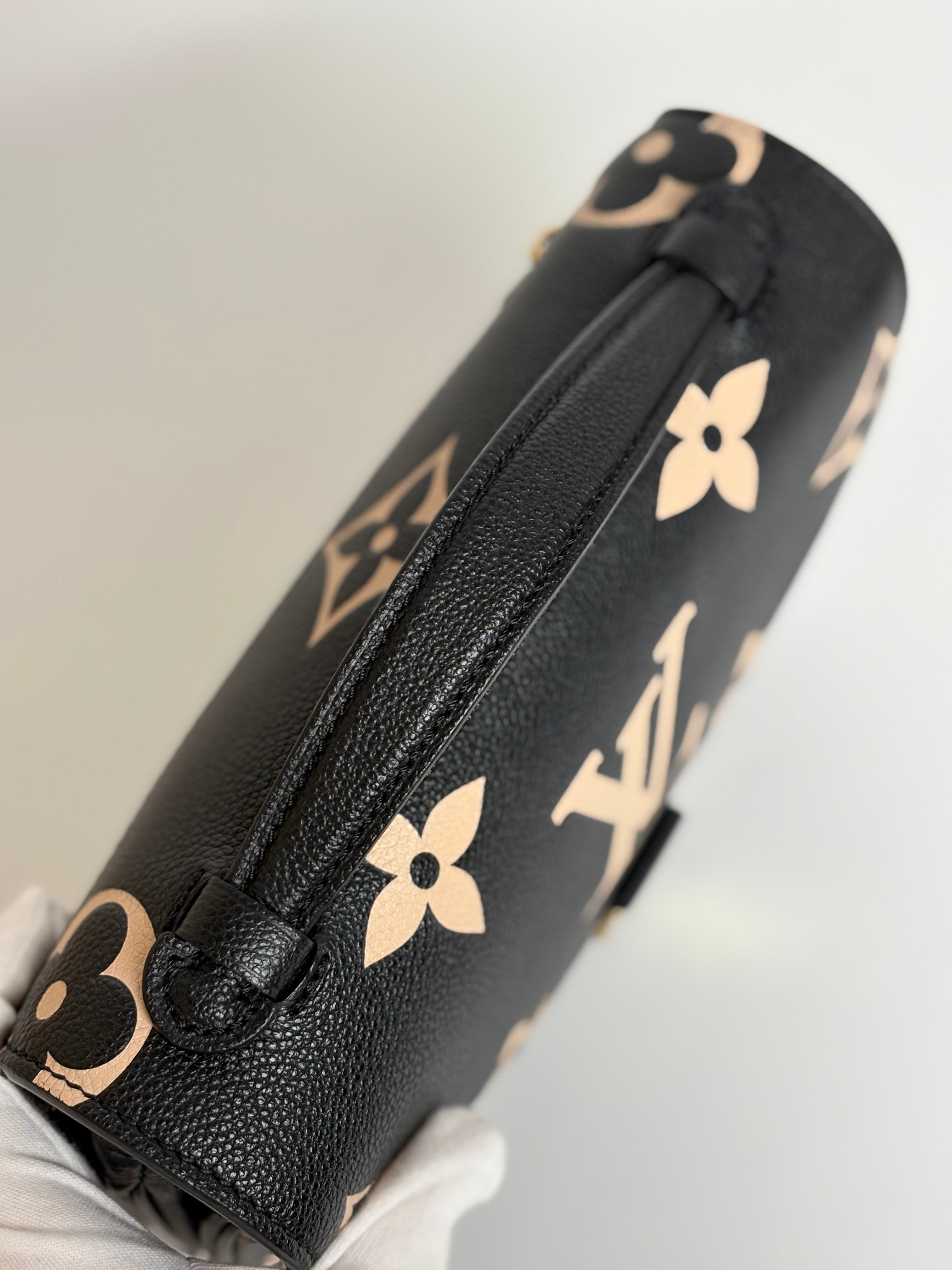 LOUIS VUITTON Bicolor Monogram Empreinte Pochette Métis