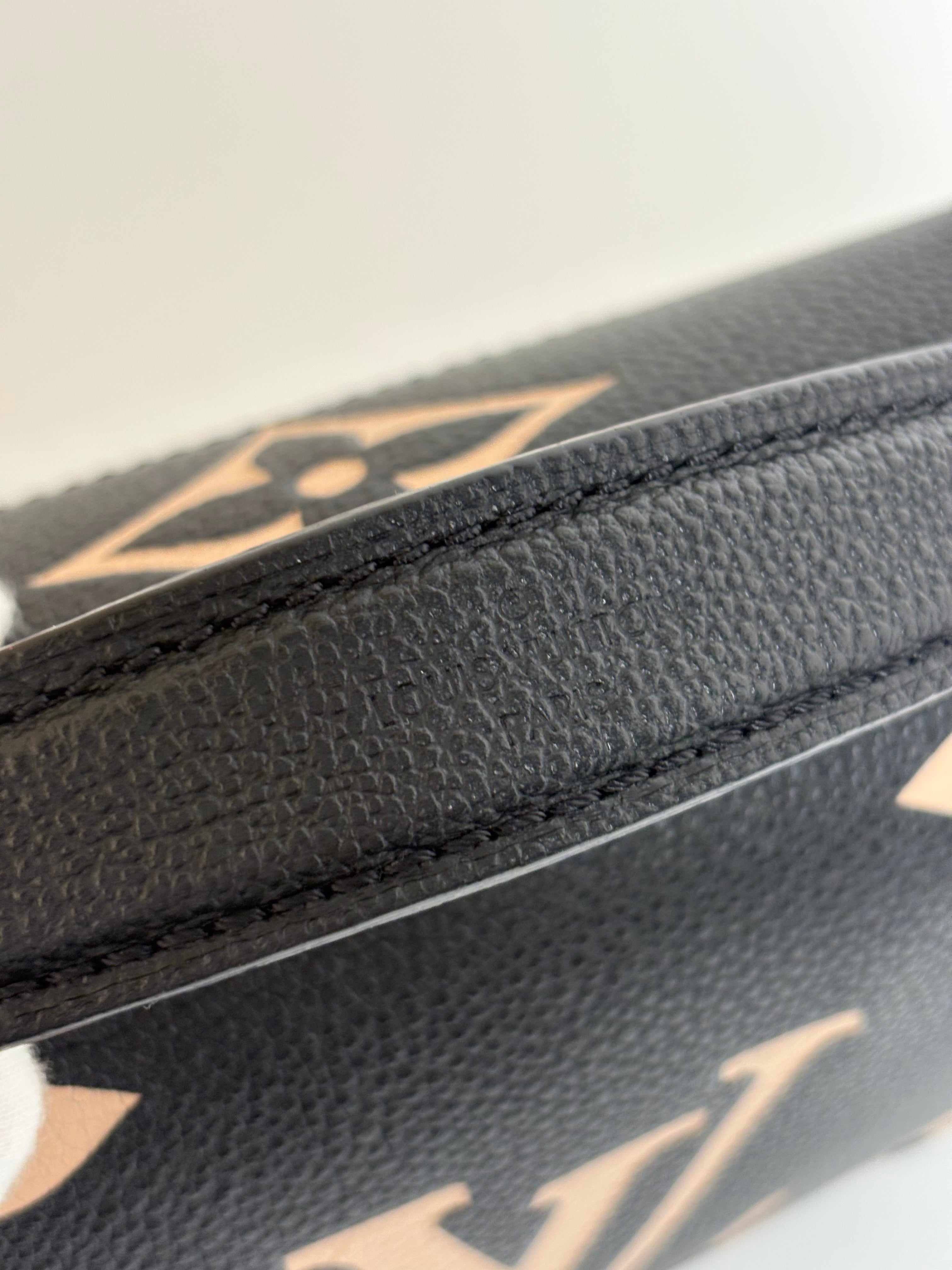LOUIS VUITTON Bicolor Monogram Empreinte Pochette Métis