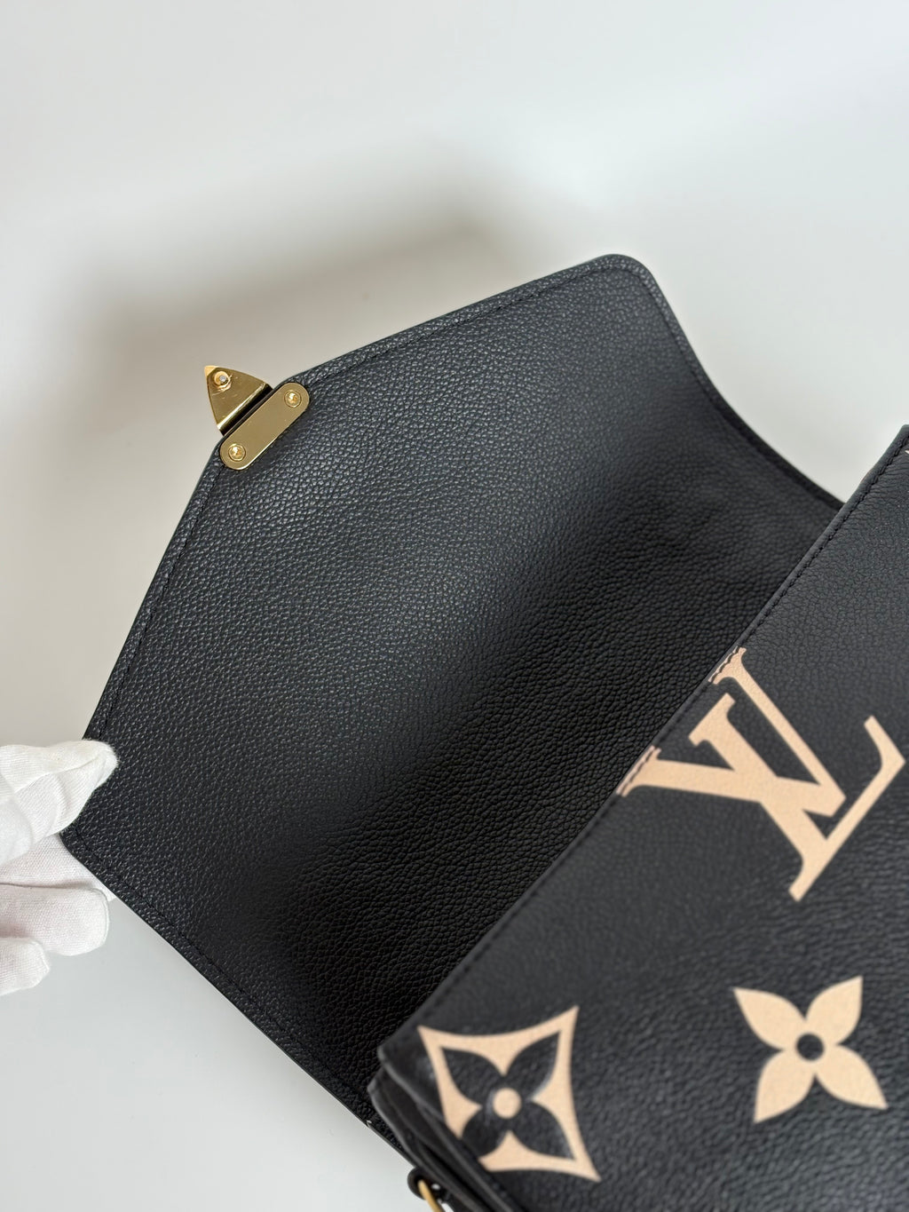 LOUIS VUITTON Bicolor Monogram Empreinte Pochette Métis