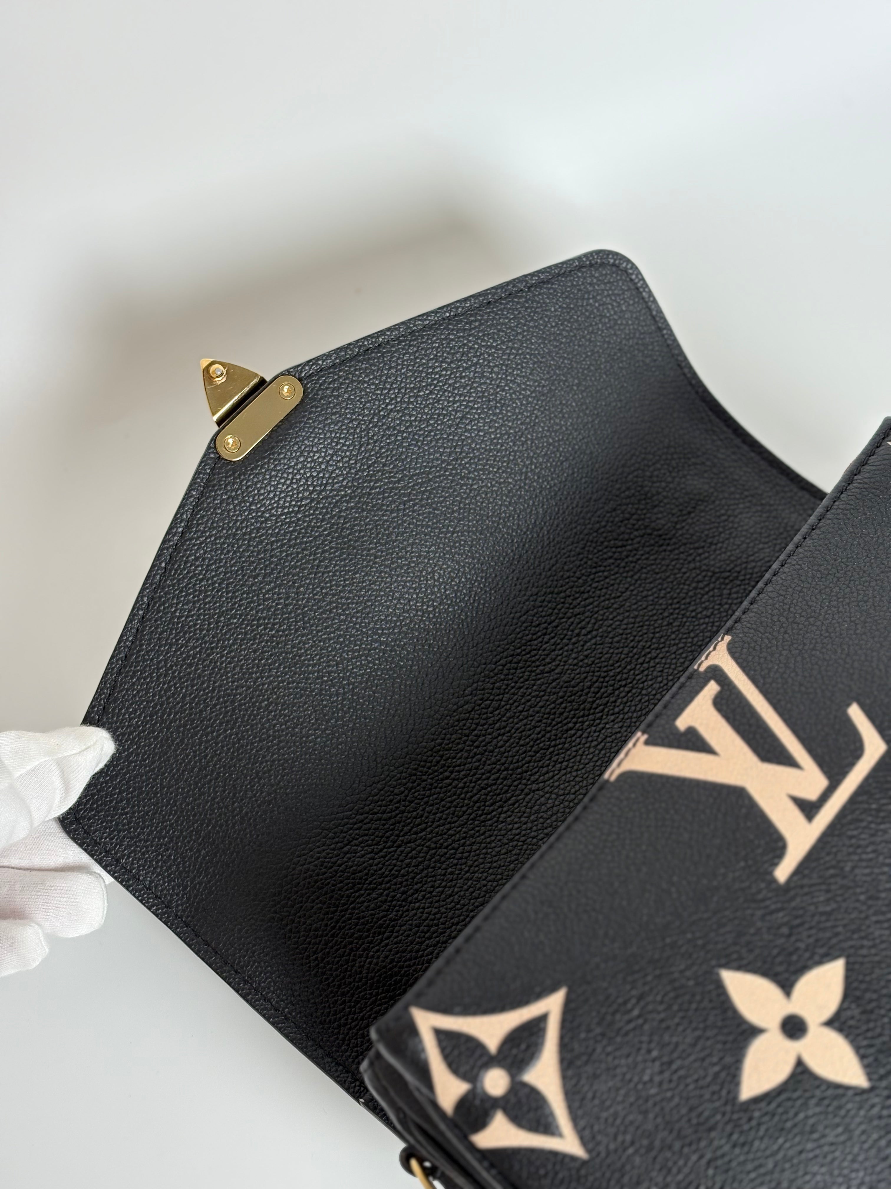 LOUIS VUITTON Bicolor Monogram Empreinte Pochette Métis