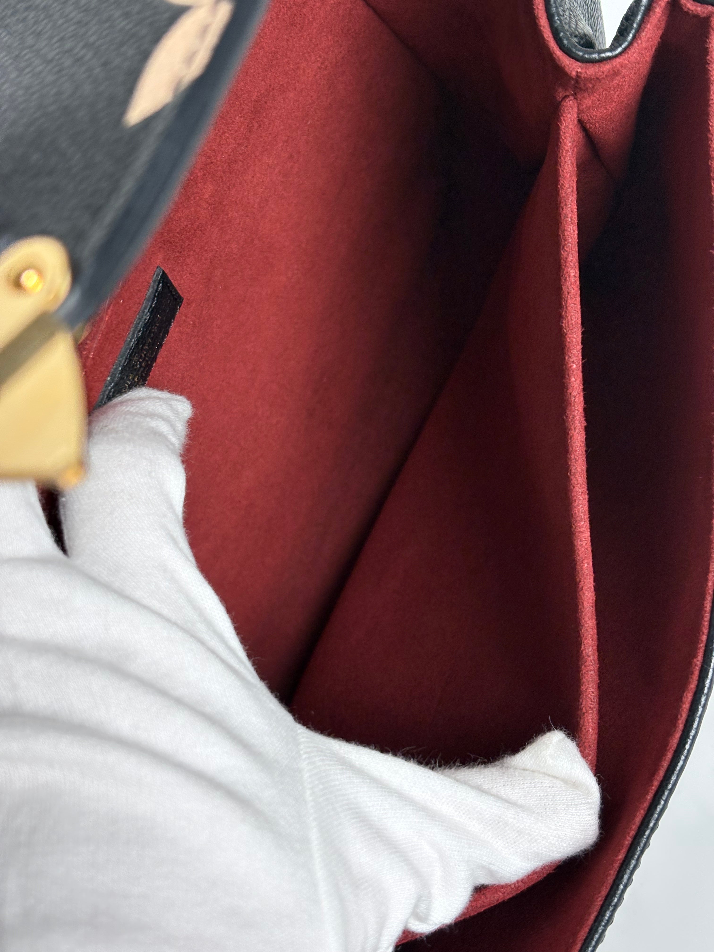 LOUIS VUITTON Bicolor Monogram Empreinte Pochette Métis