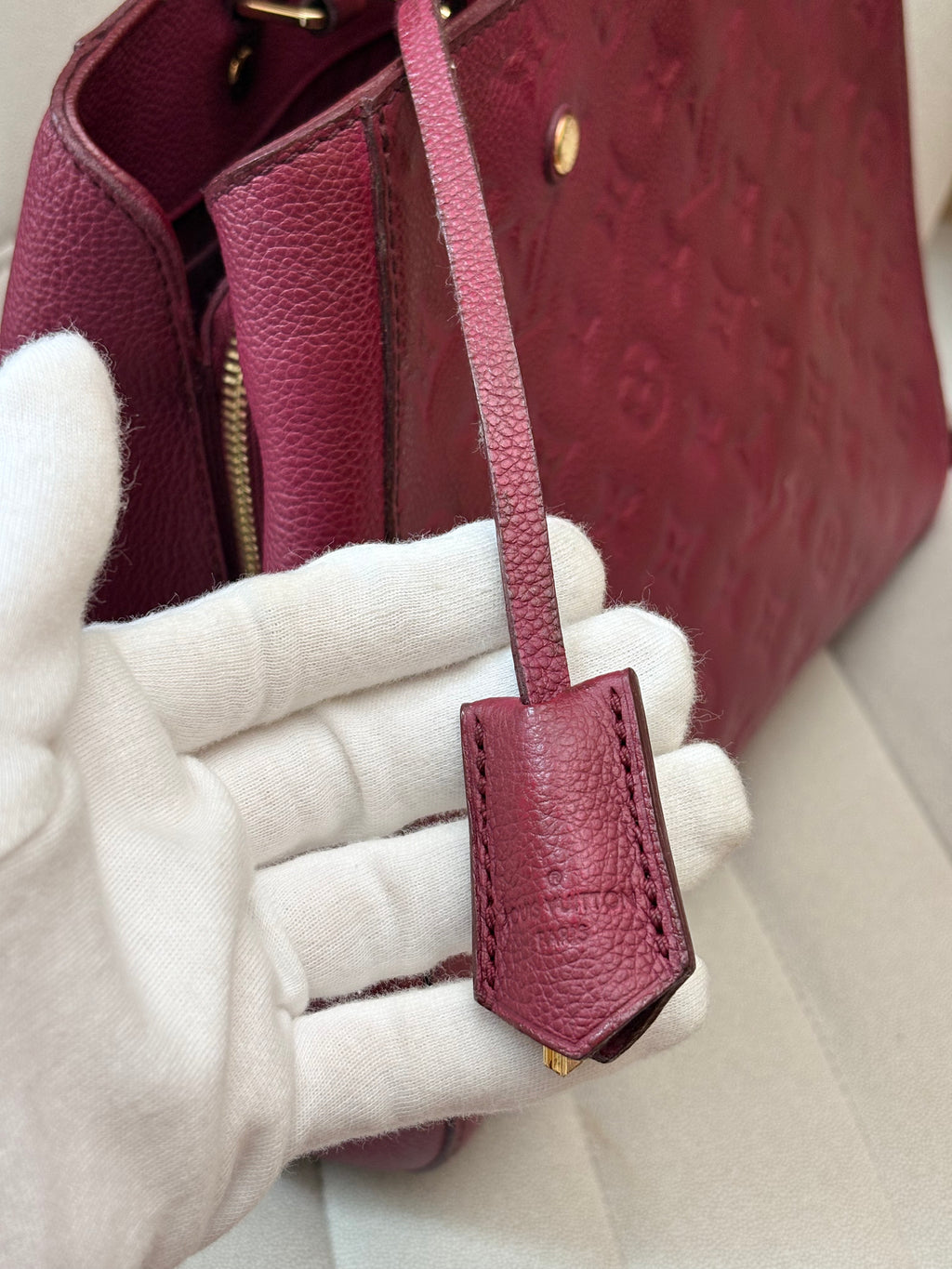 LOUIS VUITTON Montaigne MM burgundy Empreinte leather