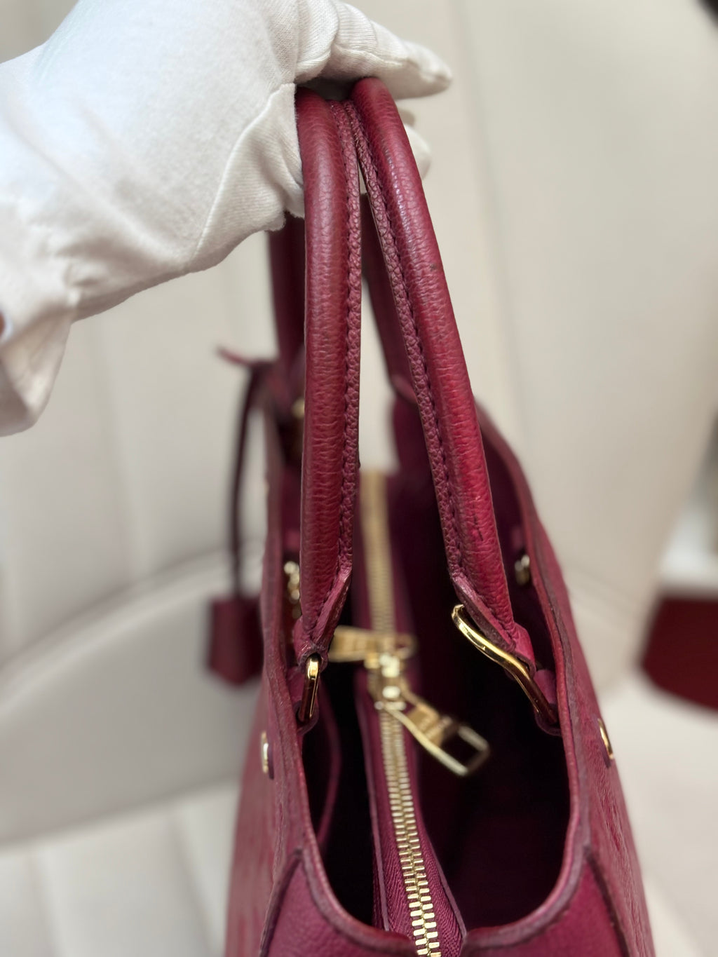LOUIS VUITTON Montaigne MM burgundy Empreinte leather
