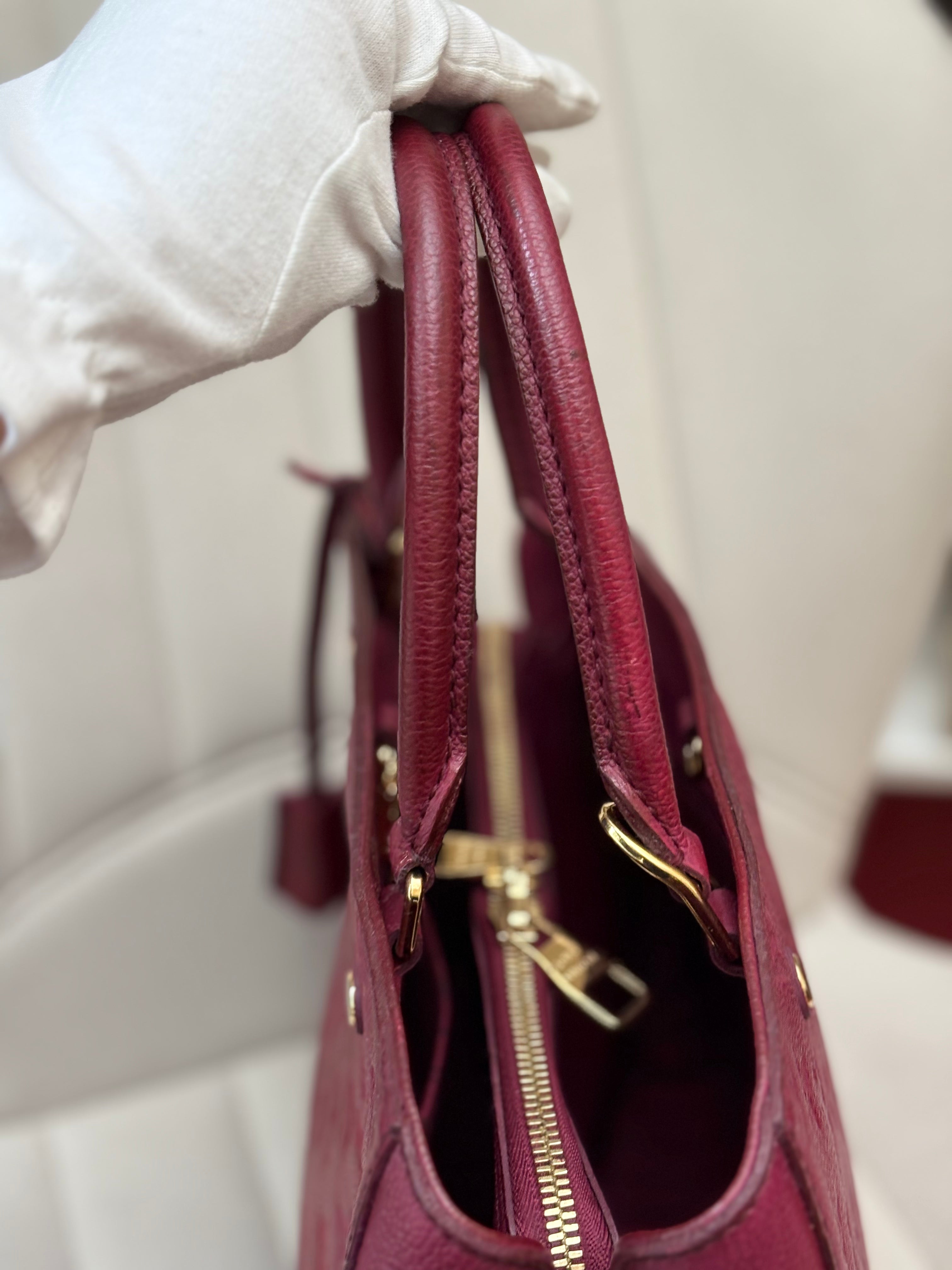 LOUIS VUITTON Montaigne MM burgundy Empreinte leather