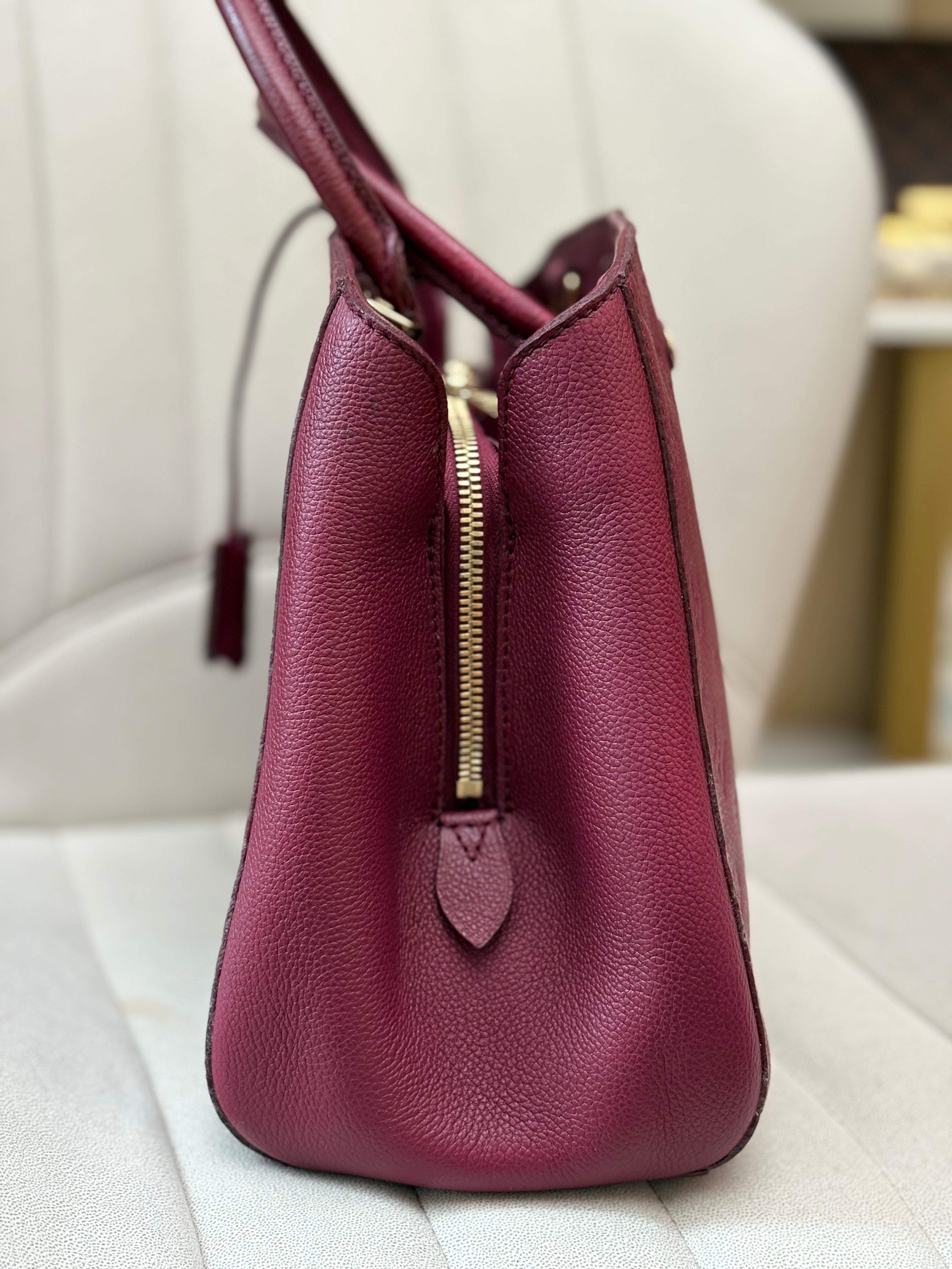 LOUIS VUITTON Montaigne MM burgundy Empreinte leather