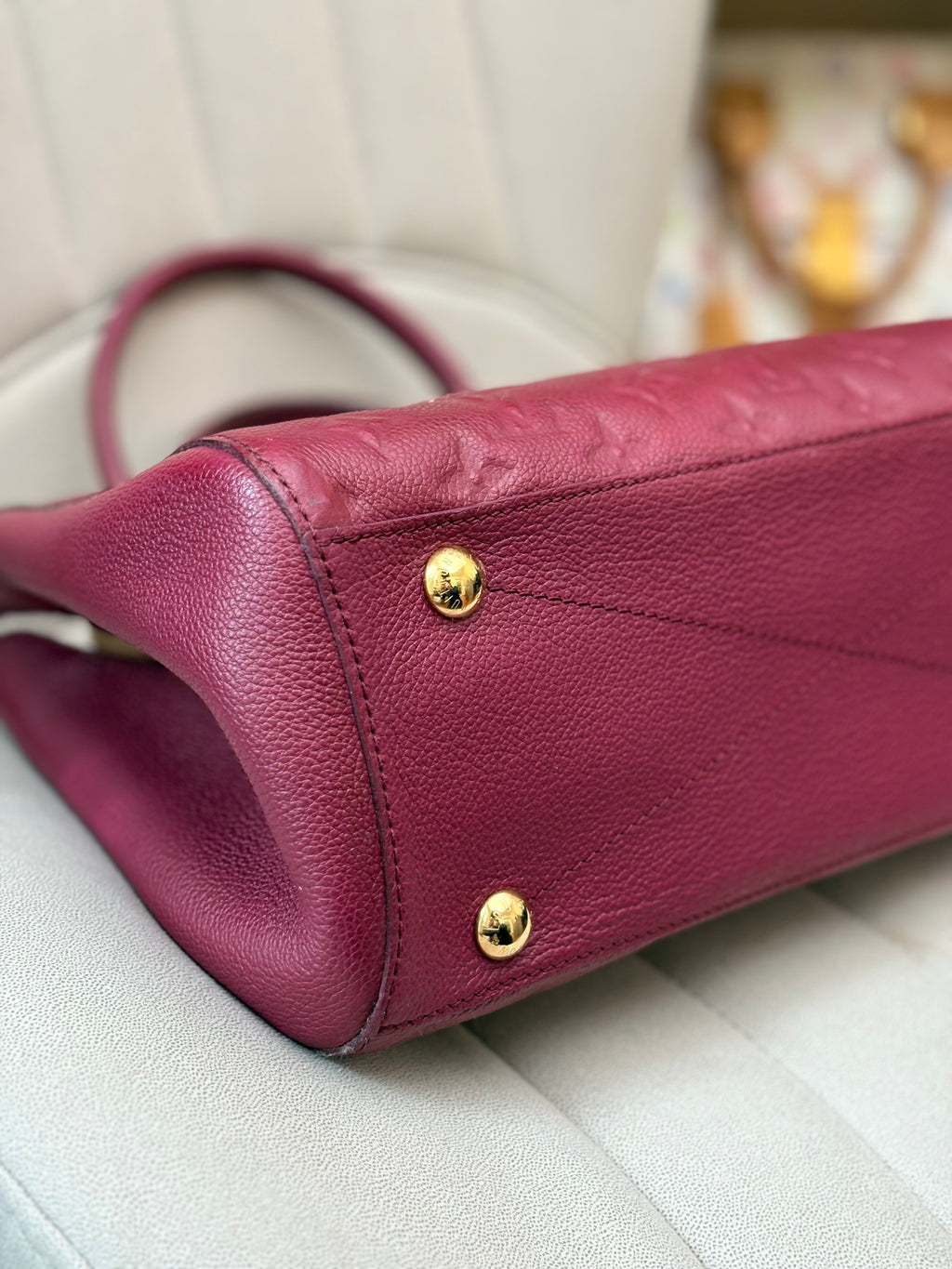 LOUIS VUITTON Montaigne MM burgundy Empreinte leather