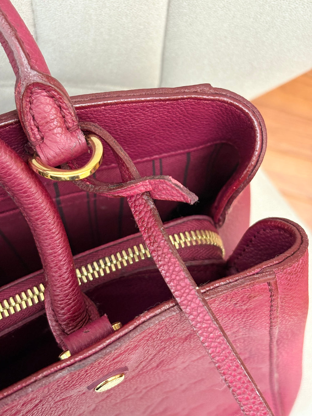 LOUIS VUITTON Montaigne MM burgundy Empreinte leather