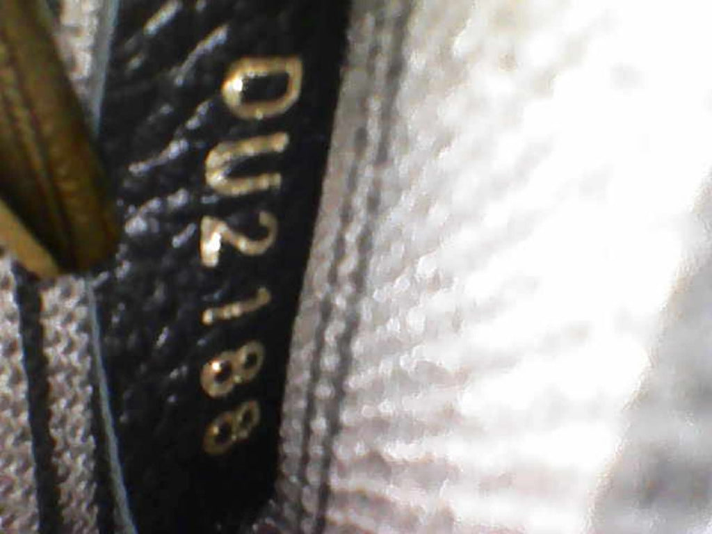 LOUIS VUITTON Pochette Metis - Black Empreinte Leather